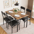 Table & 4 Upholstered Chairs
